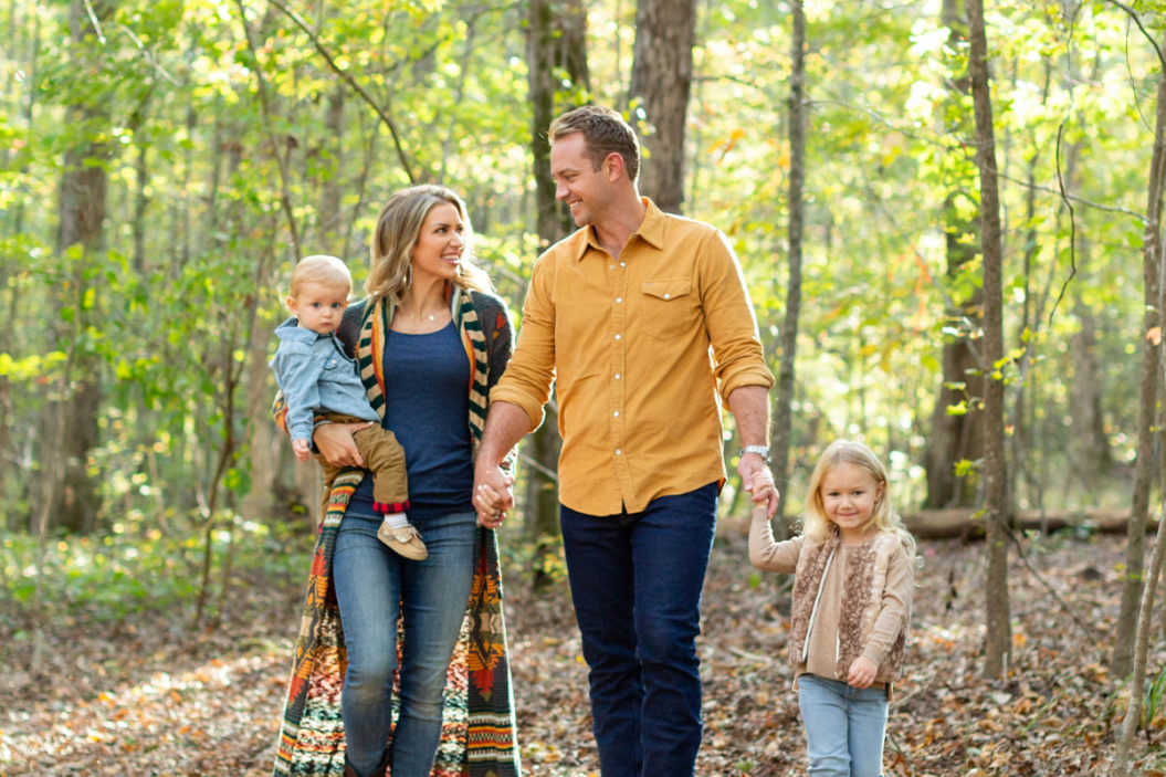 Eva Shockey and husband Tim Brent walk with their kids.